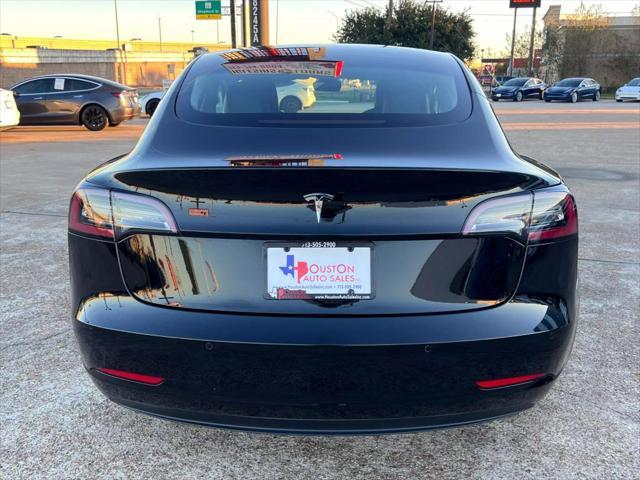 used 2022 Tesla Model 3 car, priced at $26,950