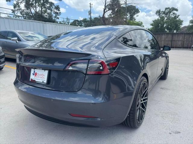 used 2018 Tesla Model 3 car, priced at $15,950