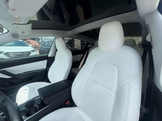 used 2018 Tesla Model 3 car, priced at $15,950
