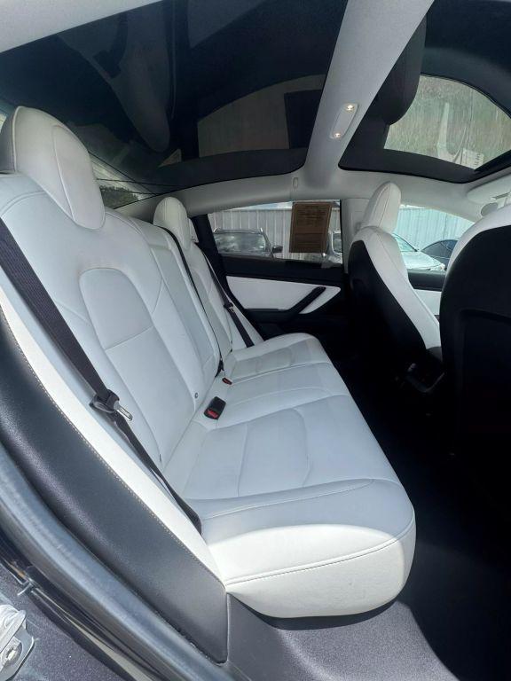 used 2018 Tesla Model 3 car, priced at $15,950