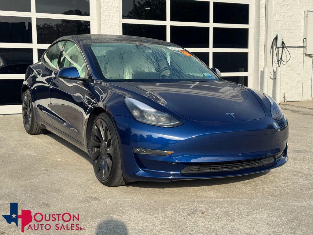 used 2023 Tesla Model 3 car, priced at $27,950