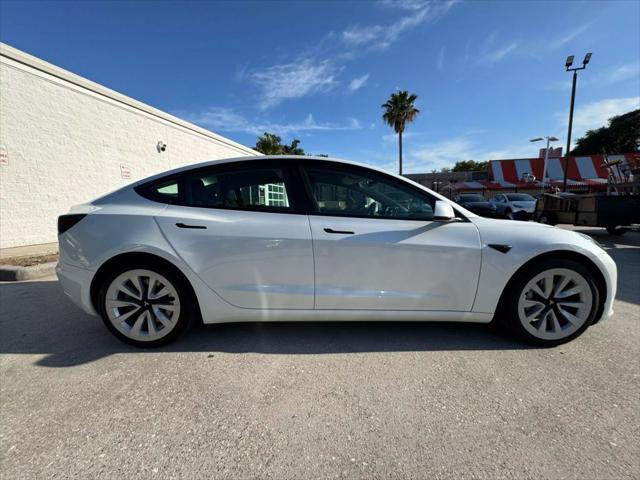 used 2022 Tesla Model 3 car, priced at $27,750