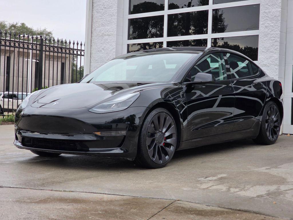 used 2021 Tesla Model 3 car, priced at $27,950
