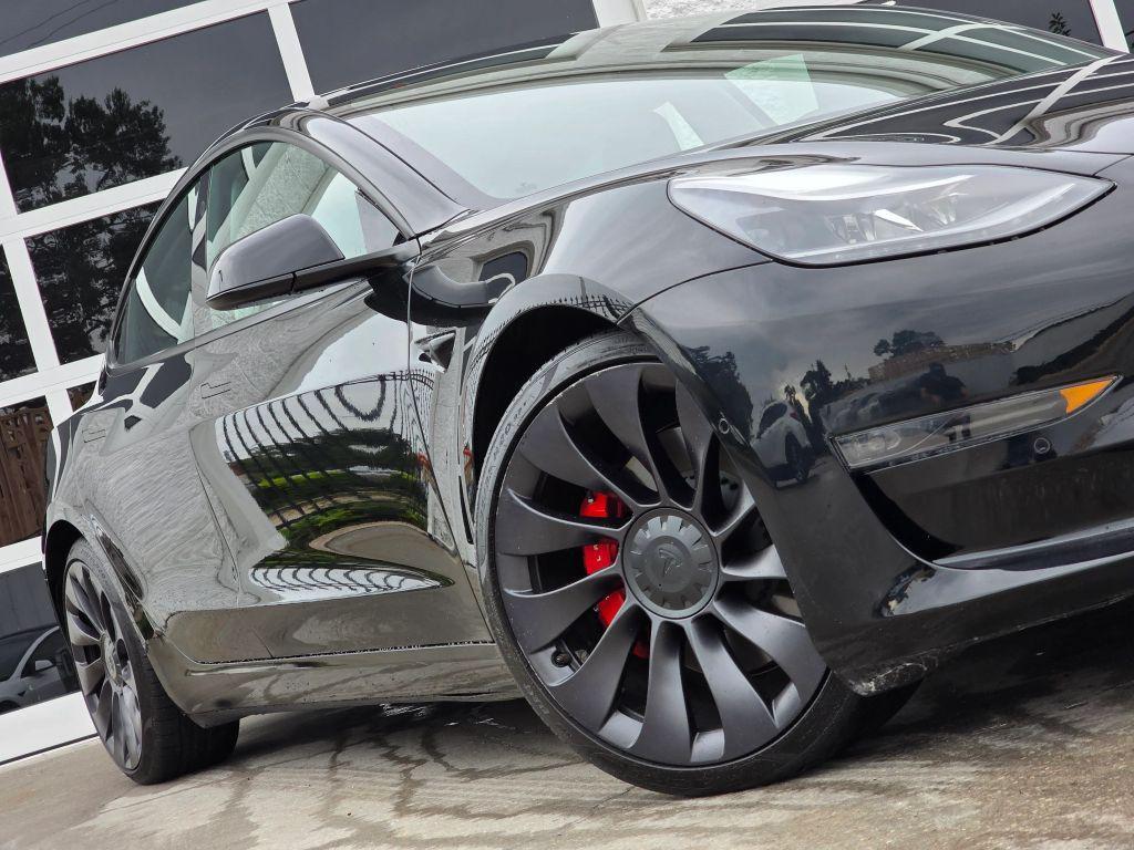 used 2021 Tesla Model 3 car, priced at $27,950