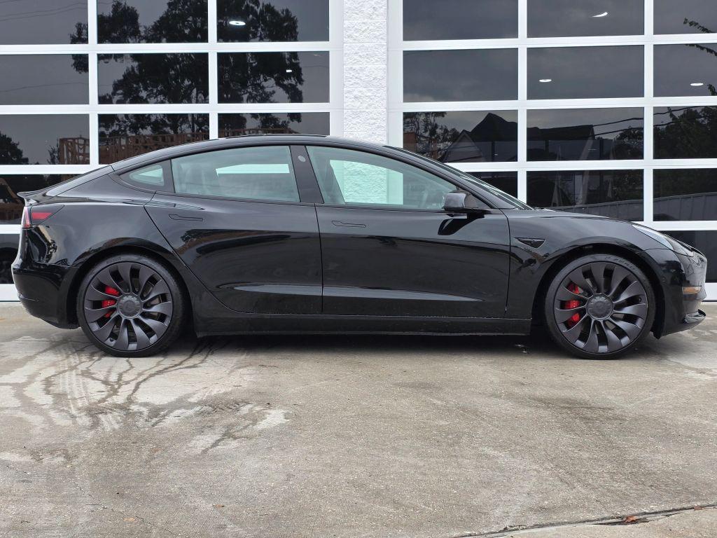used 2021 Tesla Model 3 car, priced at $27,950