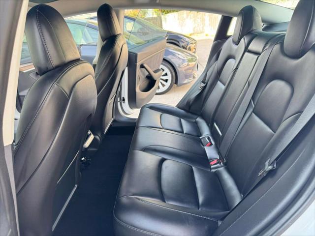 used 2023 Tesla Model 3 car, priced at $27,575