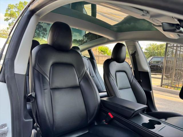 used 2023 Tesla Model 3 car, priced at $27,575