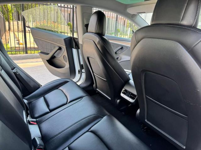 used 2023 Tesla Model 3 car, priced at $27,575