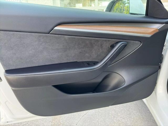 used 2023 Tesla Model 3 car, priced at $27,575