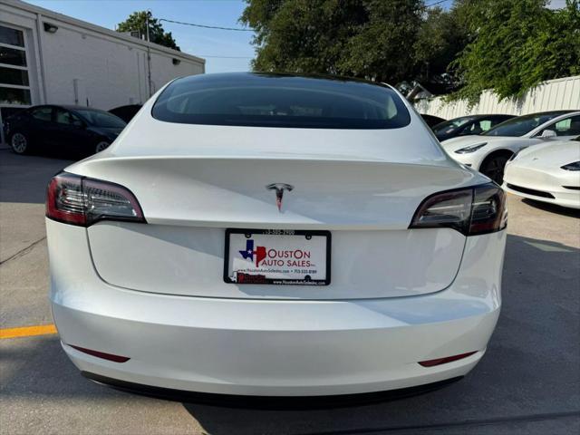 used 2023 Tesla Model 3 car, priced at $27,575