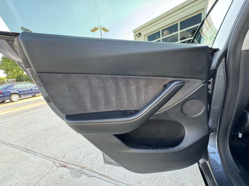 used 2023 Tesla Model Y car, priced at $32,950