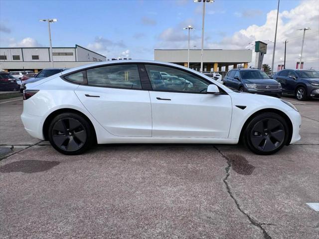 used 2022 Tesla Model 3 car, priced at $26,950