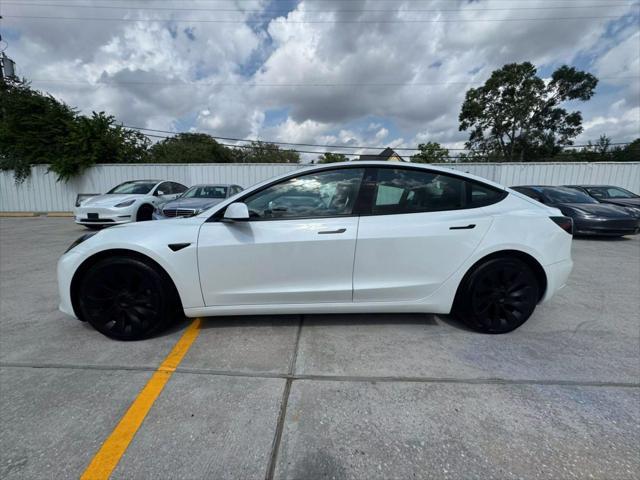 used 2023 Tesla Model 3 car, priced at $24,950