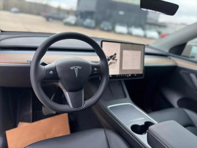 used 2023 Tesla Model Y car, priced at $29,950