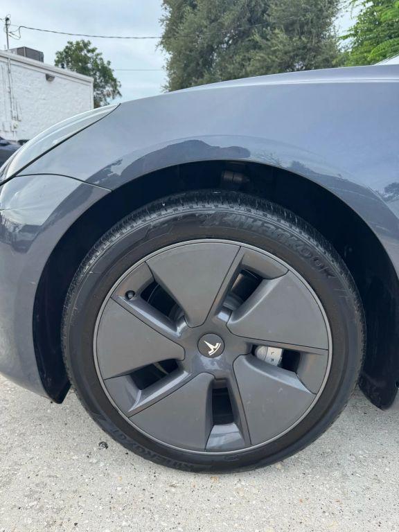 used 2023 Tesla Model 3 car, priced at $24,675