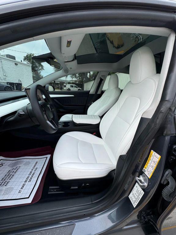used 2023 Tesla Model 3 car, priced at $24,675