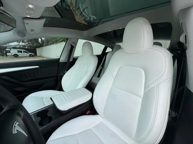 used 2023 Tesla Model 3 car, priced at $24,675
