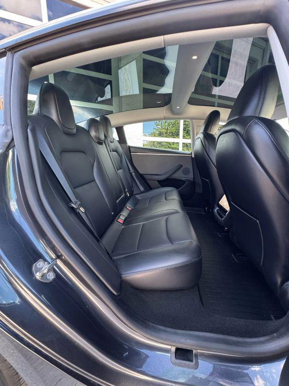 used 2024 Tesla Model 3 car, priced at $31,950