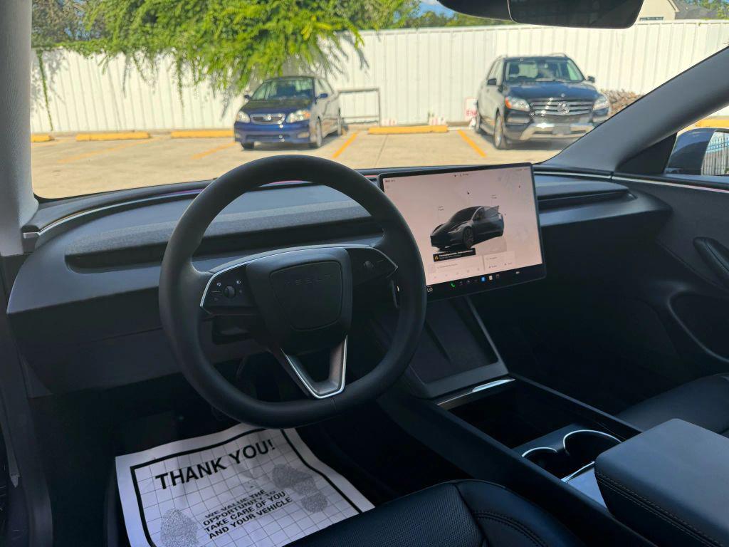 used 2024 Tesla Model 3 car, priced at $31,950
