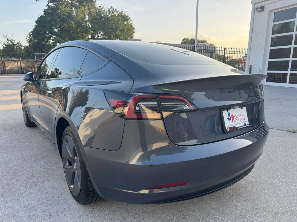 used 2023 Tesla Model 3 car, priced at $24,675