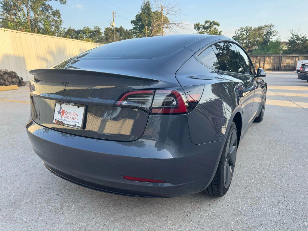 used 2023 Tesla Model 3 car, priced at $24,675