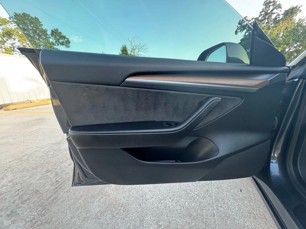 used 2023 Tesla Model 3 car, priced at $24,675