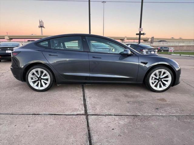 used 2022 Tesla Model 3 car, priced at $27,950