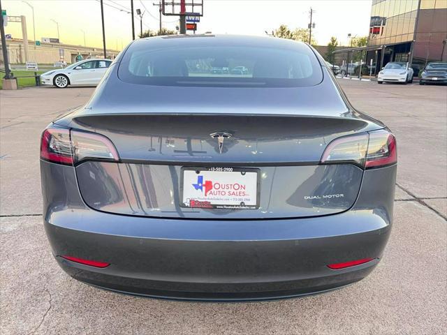 used 2022 Tesla Model 3 car, priced at $27,950