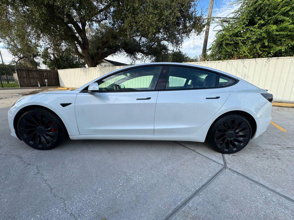 used 2022 Tesla Model 3 car, priced at $28,940