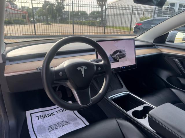 used 2022 Tesla Model 3 car, priced at $26,750