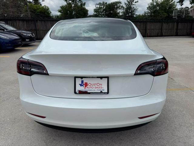 used 2022 Tesla Model 3 car, priced at $27,950