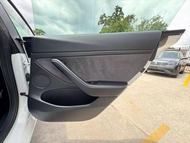 used 2022 Tesla Model 3 car, priced at $27,950