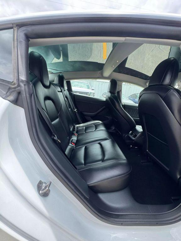 used 2022 Tesla Model 3 car, priced at $27,950