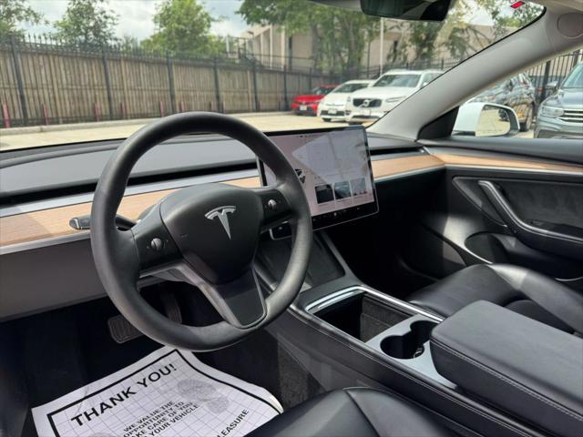 used 2022 Tesla Model 3 car, priced at $27,950