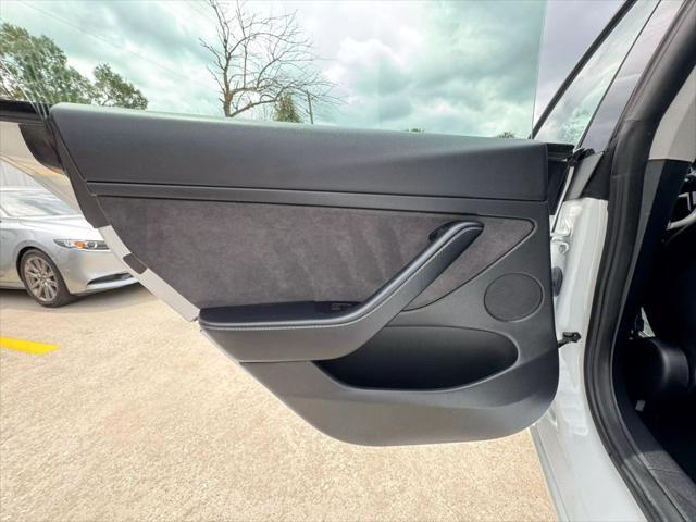 used 2022 Tesla Model 3 car, priced at $27,950
