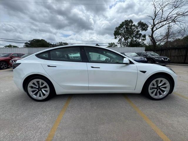 used 2022 Tesla Model 3 car, priced at $27,950