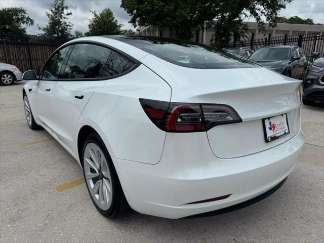 used 2022 Tesla Model 3 car, priced at $27,950