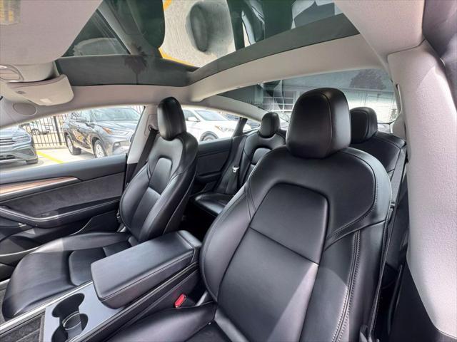 used 2022 Tesla Model 3 car, priced at $27,950