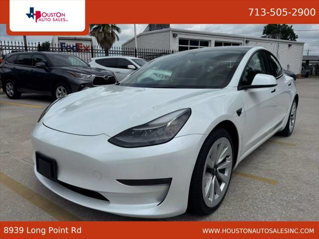 used 2022 Tesla Model 3 car, priced at $27,950