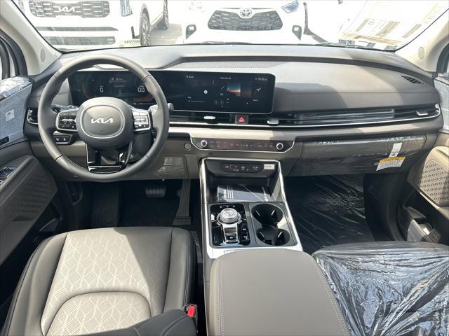 new 2025 Kia Carnival Hybrid car, priced at $44,847