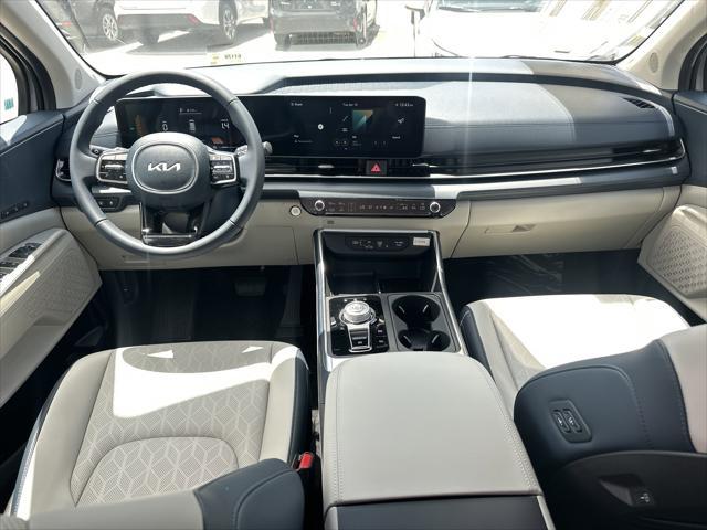new 2025 Kia Carnival Hybrid car, priced at $45,387