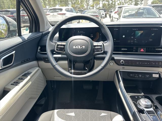 new 2025 Kia Carnival Hybrid car, priced at $45,387