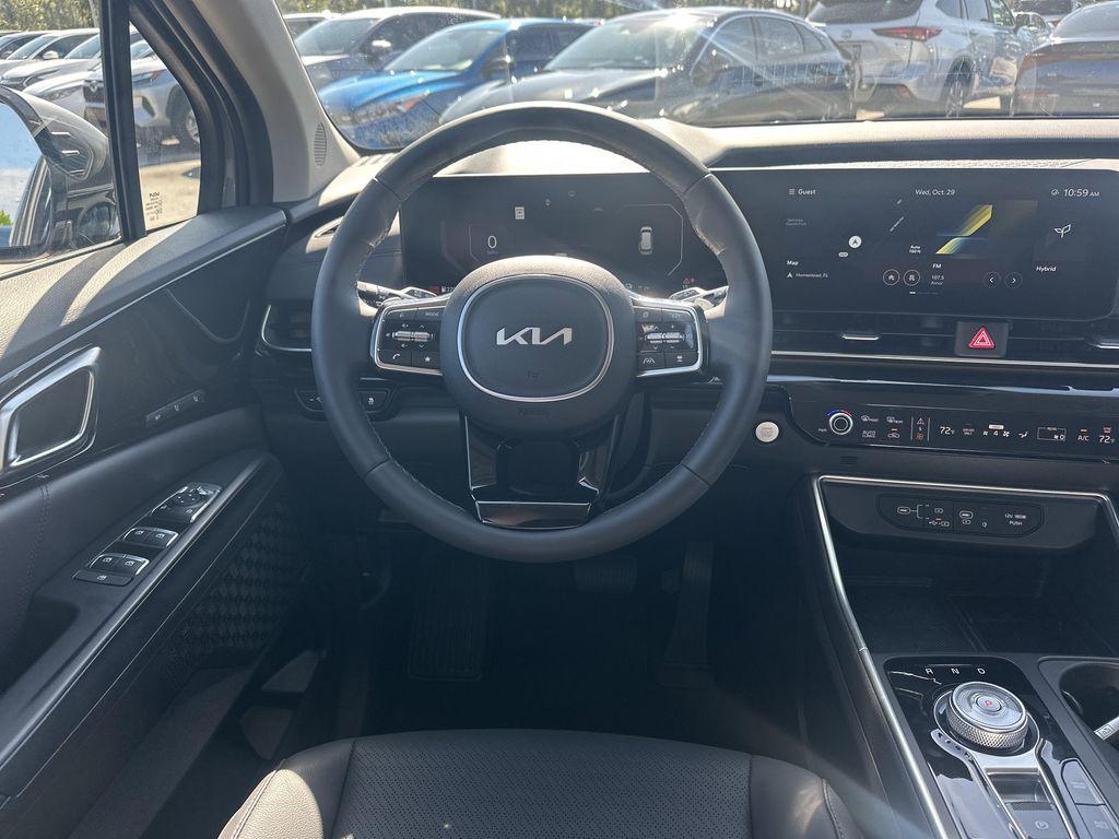 new 2025 Kia Carnival Hybrid car, priced at $56,443