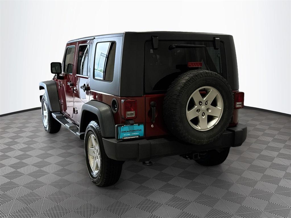 used 2010 Jeep Wrangler Unlimited car, priced at $15,497