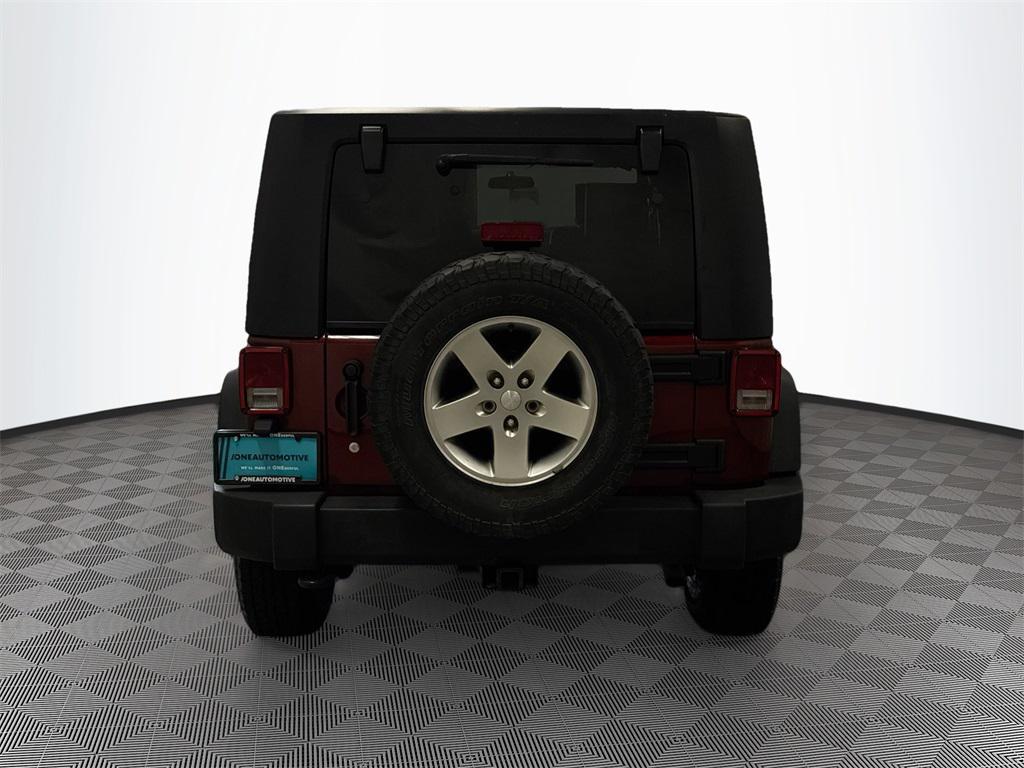 used 2010 Jeep Wrangler Unlimited car, priced at $15,497