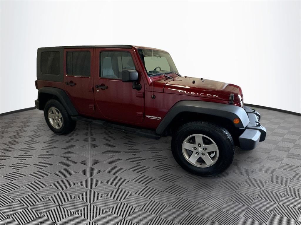 used 2010 Jeep Wrangler Unlimited car, priced at $15,497