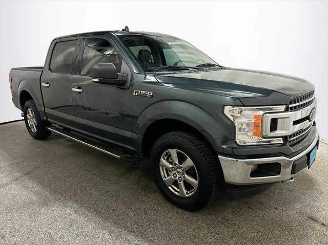 used 2018 Ford F-150 car, priced at $23,444