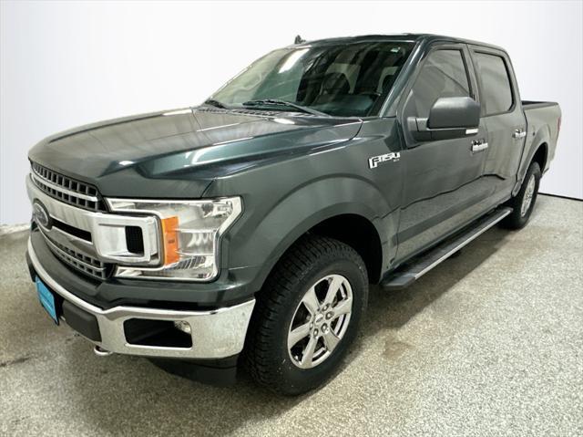 used 2018 Ford F-150 car, priced at $23,444