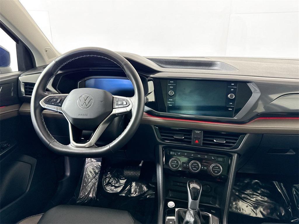 used 2024 Volkswagen Taos car, priced at $25,497