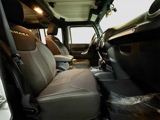 used 2014 Jeep Wrangler Unlimited car, priced at $17,364